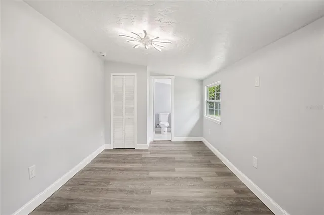 a view of a swimming pool with a yard