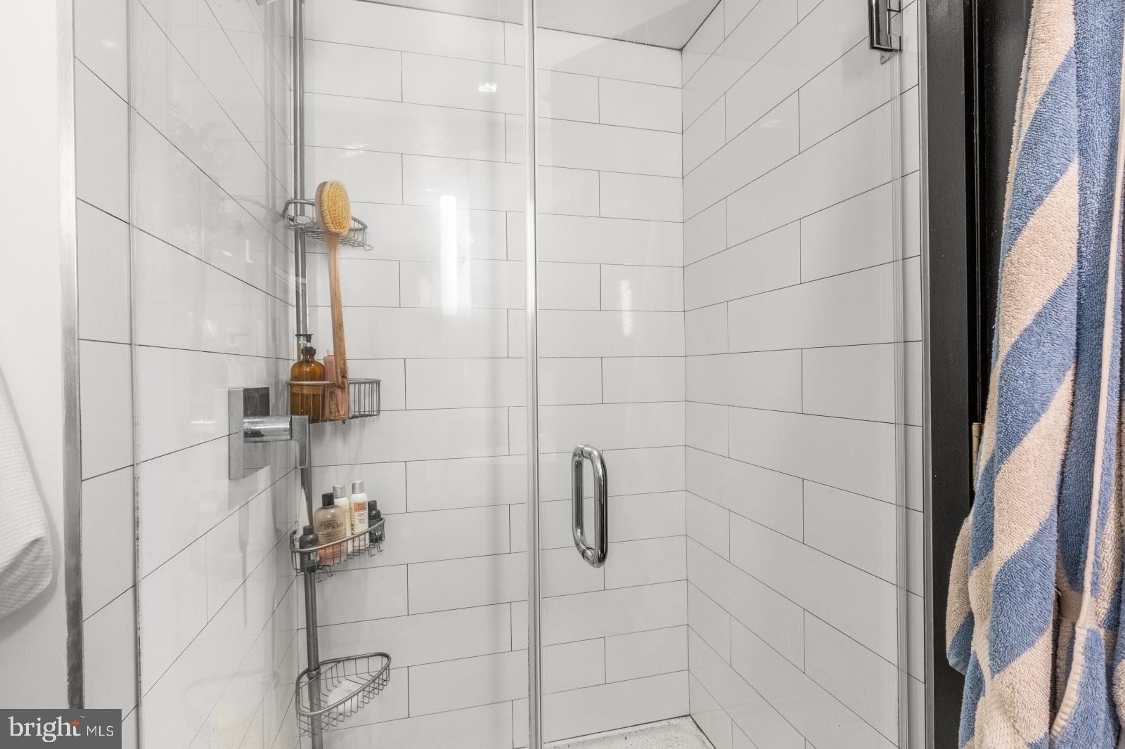 1701 Tulip Street, Unit LL2 Philadelphia, PA 19125 - Photo 16 of 27 a bathroom with a shower