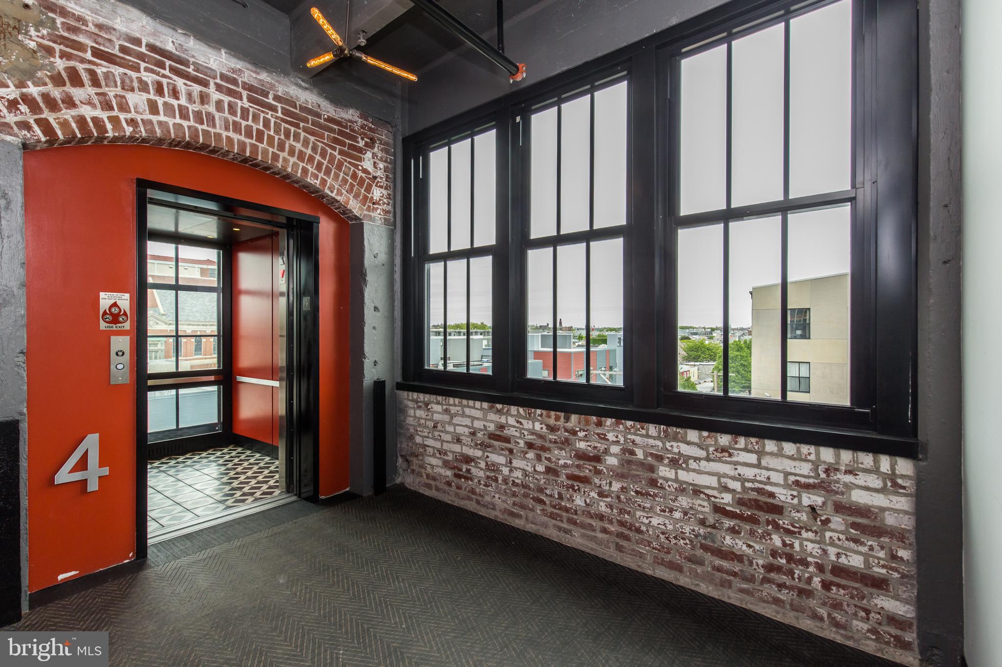 1701 Tulip Street, Unit LL2 Philadelphia, PA 19125 - Photo 19 of 27 a view of an empty room and window
