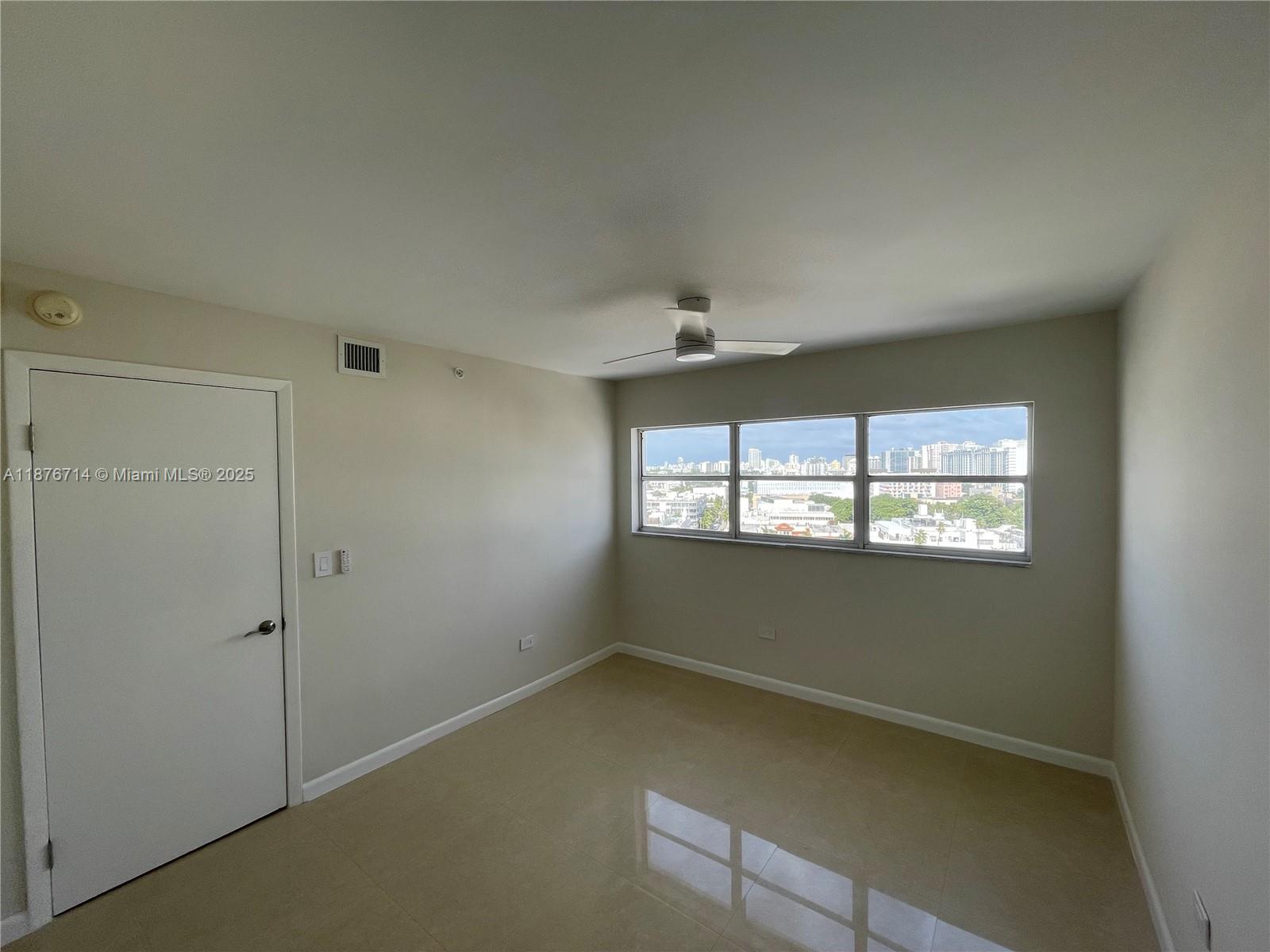1881 Washington Avenue, Unit 15C Miami Beach, FL 33139 - Photo 13 of 30 a view of empty room with window