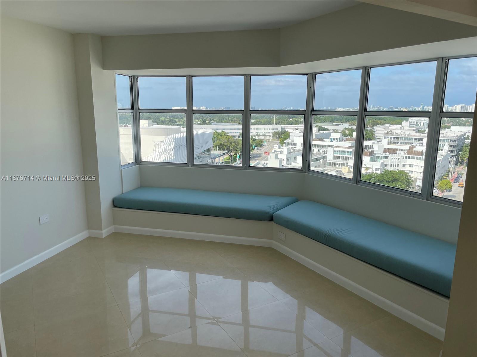 1881 Washington Avenue, Unit 15C Miami Beach, FL 33139 - Photo 4 of 30 a living room with a large window