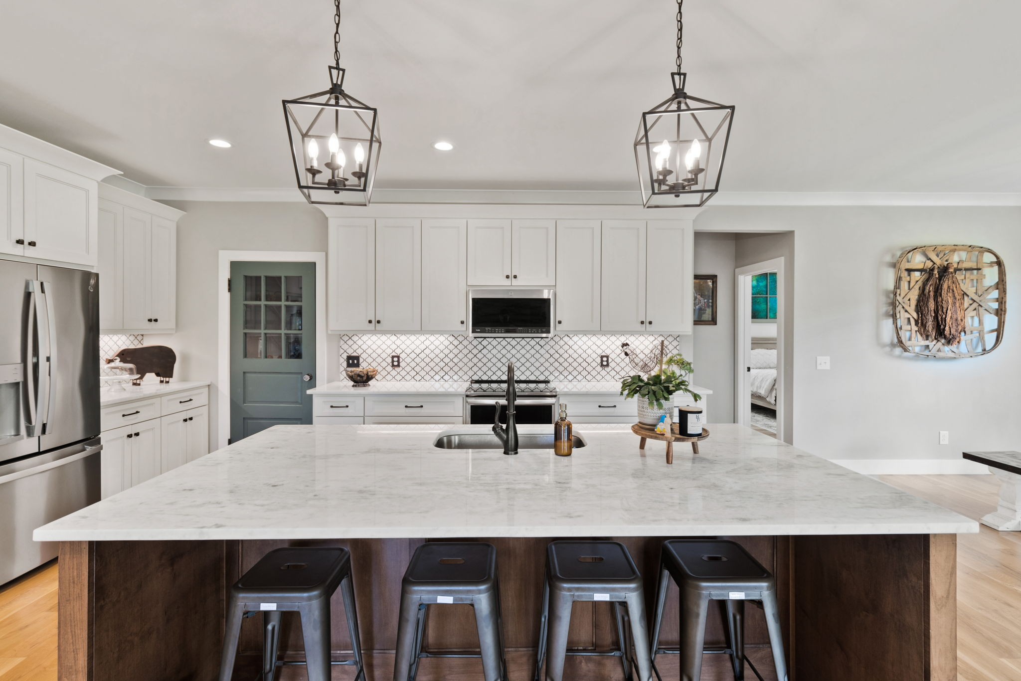 5651 Flewellyn Road Springfield, TN 37172 - Photo 16 of 55 a kitchen with stainless steel appliances granite countertop a dining table chairs and refrigerator