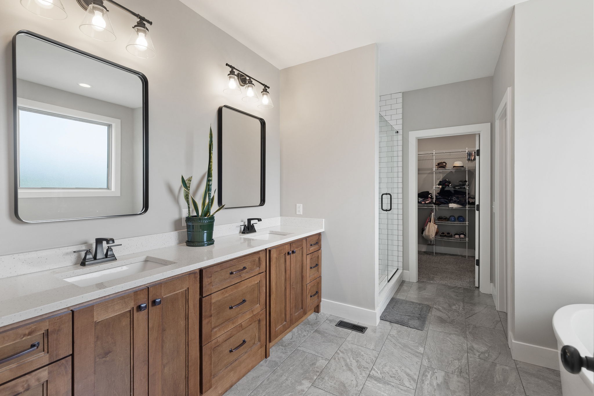 5651 Flewellyn Road Springfield, TN 37172 - Photo 24 of 55 a spacious bathroom with a double vanity sink mirror and toilet