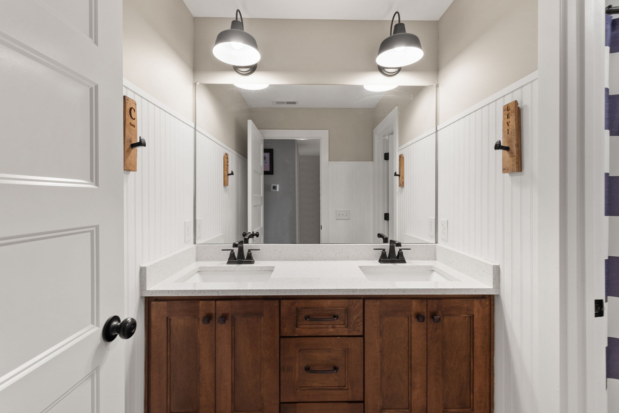 5651 Flewellyn Road Springfield, TN 37172 - Photo 35 of 55 a bathroom with a double vanity sink and a mirror