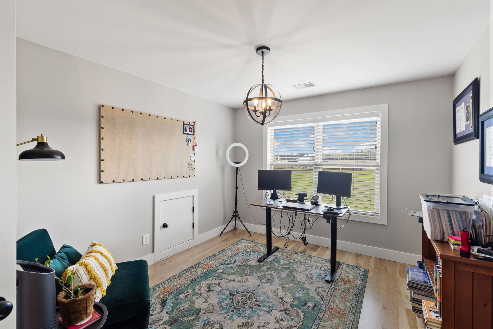 5651 Flewellyn Road Springfield, TN 37172 - Photo 39 of 55 a view of a workspace with furniture and a window