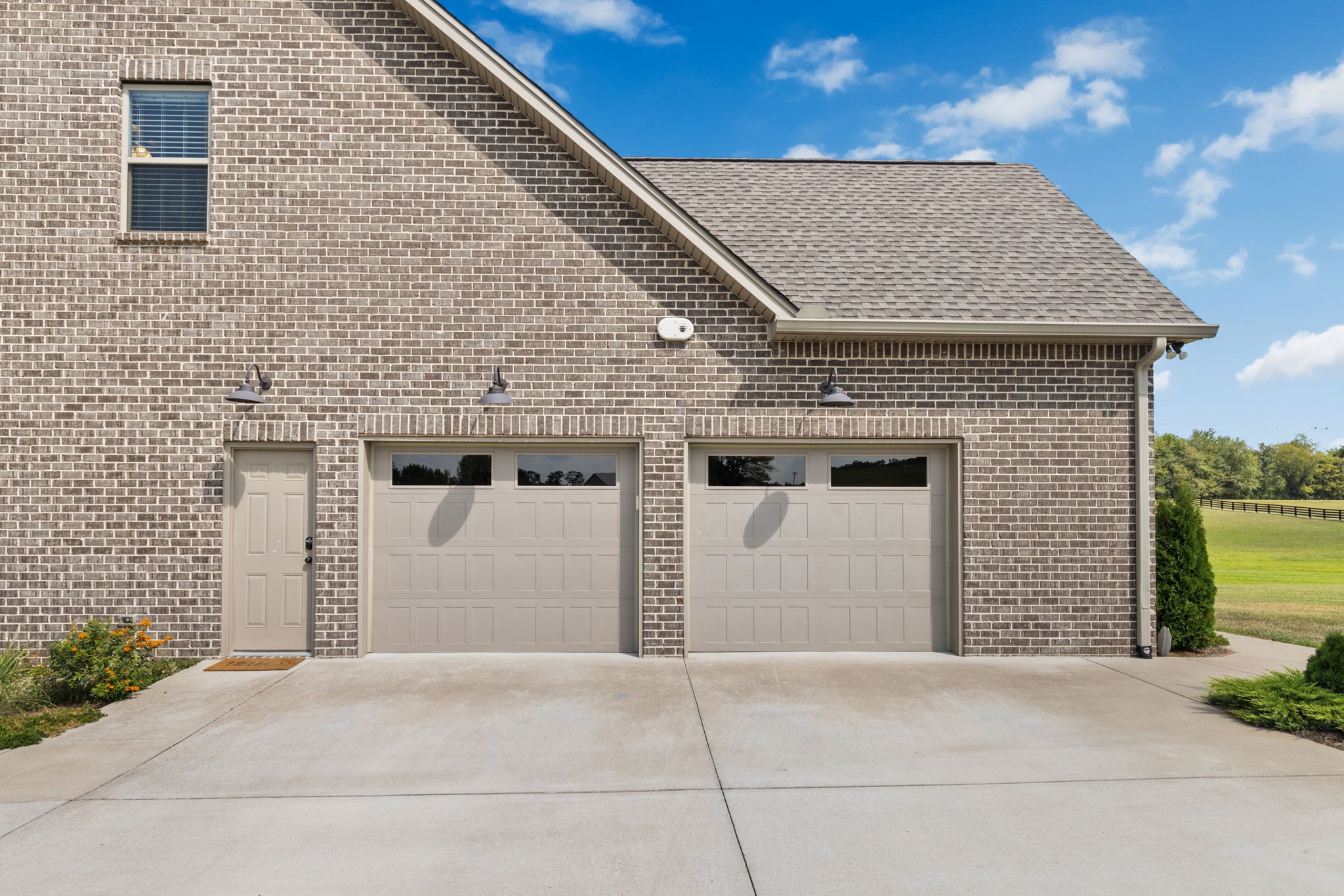 5651 Flewellyn Road Springfield, TN 37172 - Photo 52 of 55 a front view of a house with a yard and garage