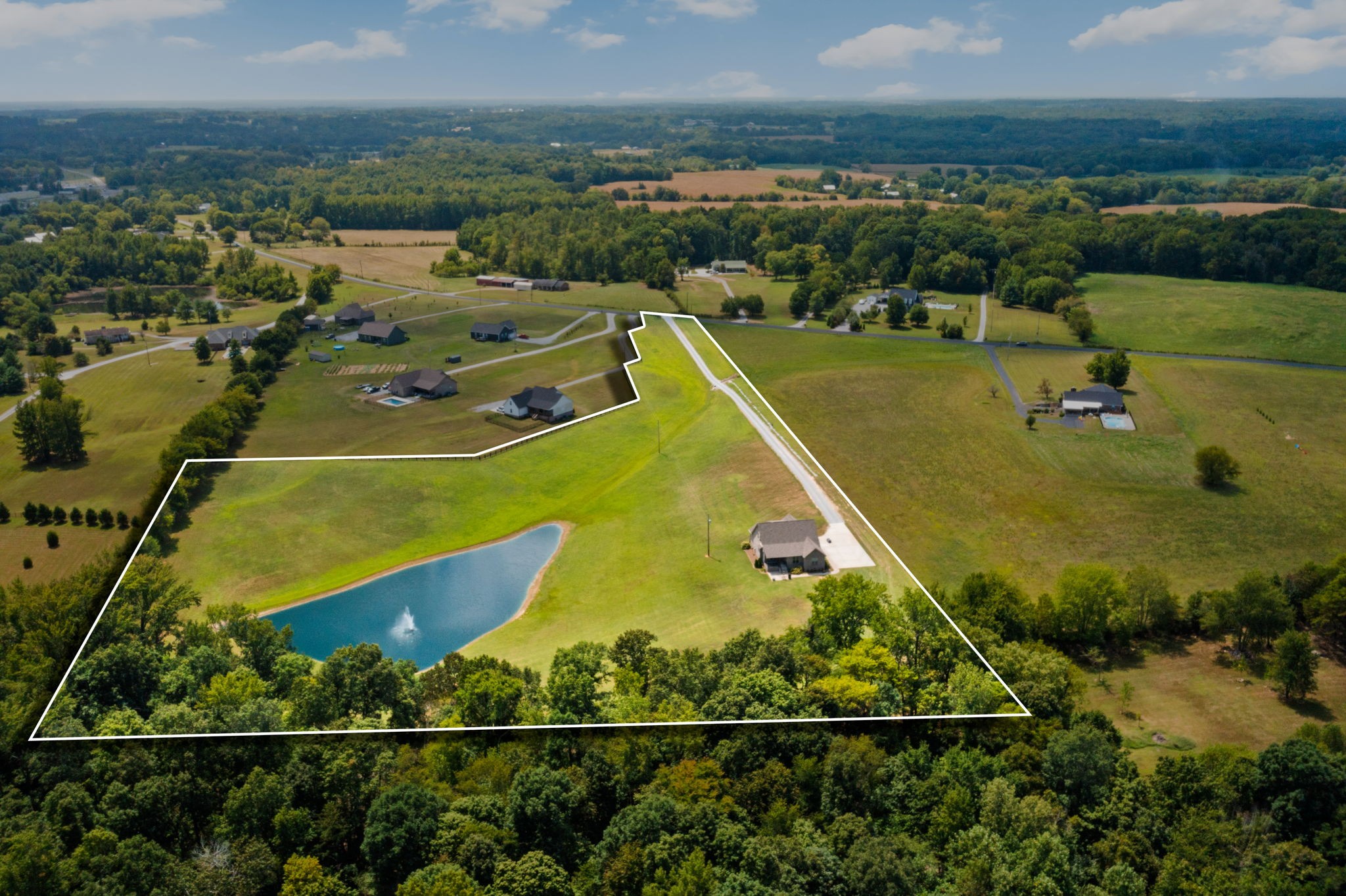 5651 Flewellyn Road Springfield, TN 37172 - Photo 55 of 55 an aerial view of a house with a swimming pool