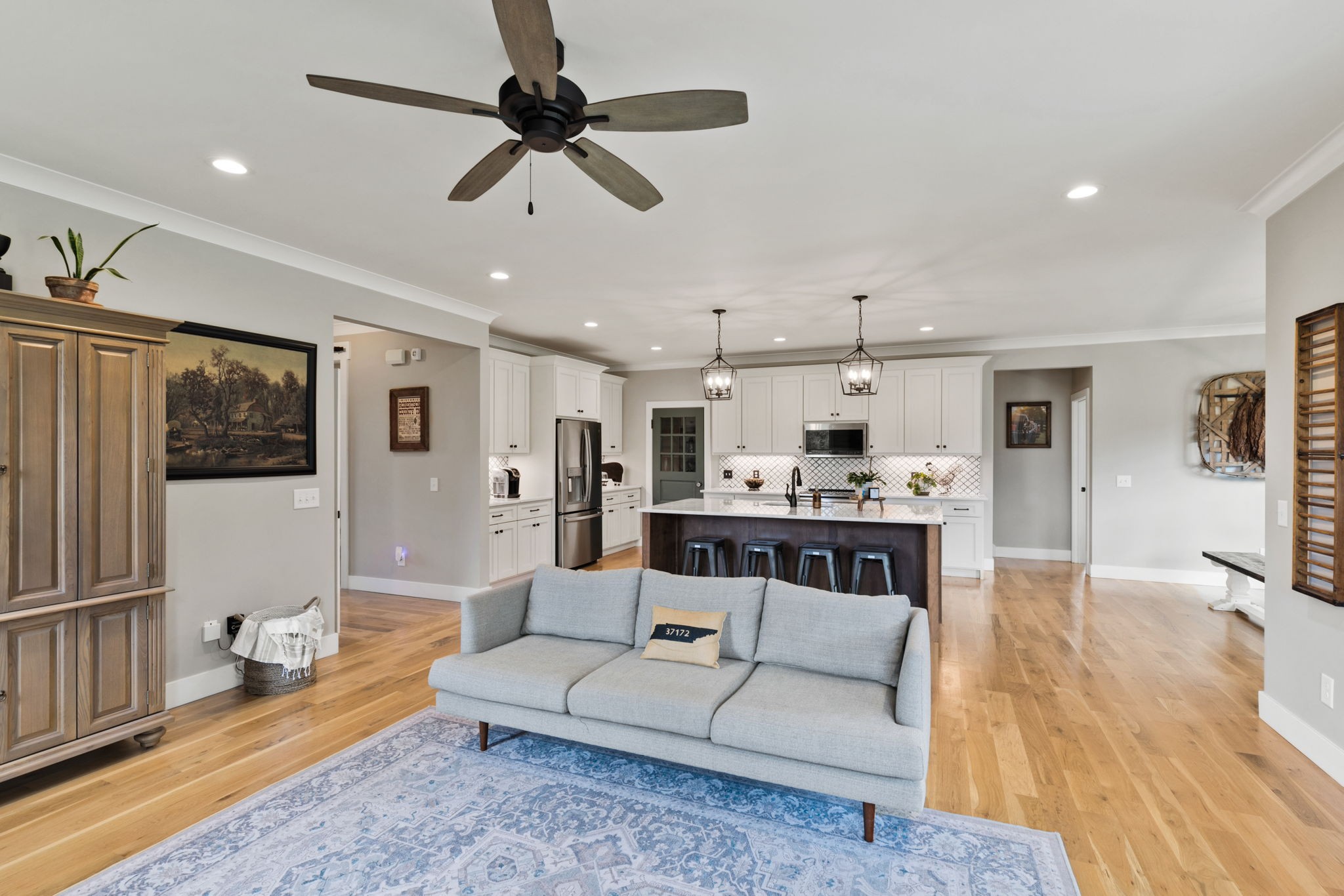 5651 Flewellyn Road Springfield, TN 37172 - Photo 8 of 55 a living room with furniture and a view of kitchen
