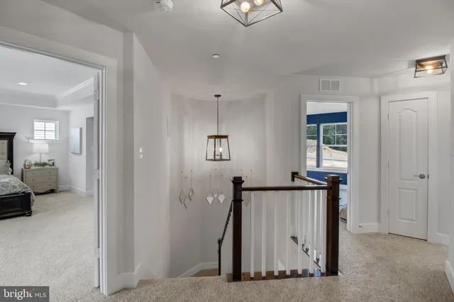 a view of a livingroom with furniture and windows