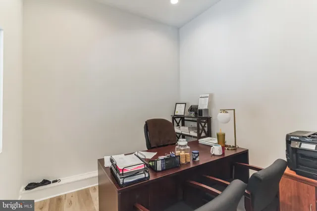 a room with furniture and wooden floor