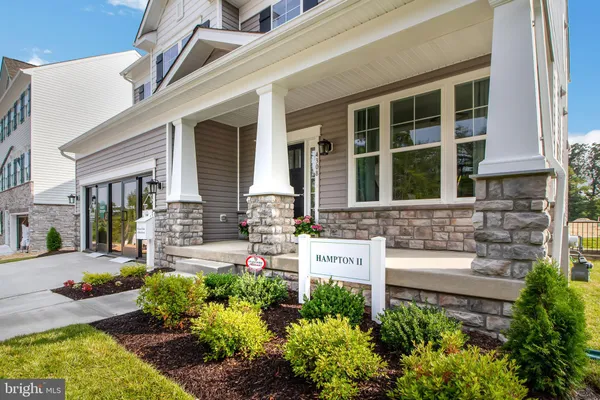 front view of a house with a patio