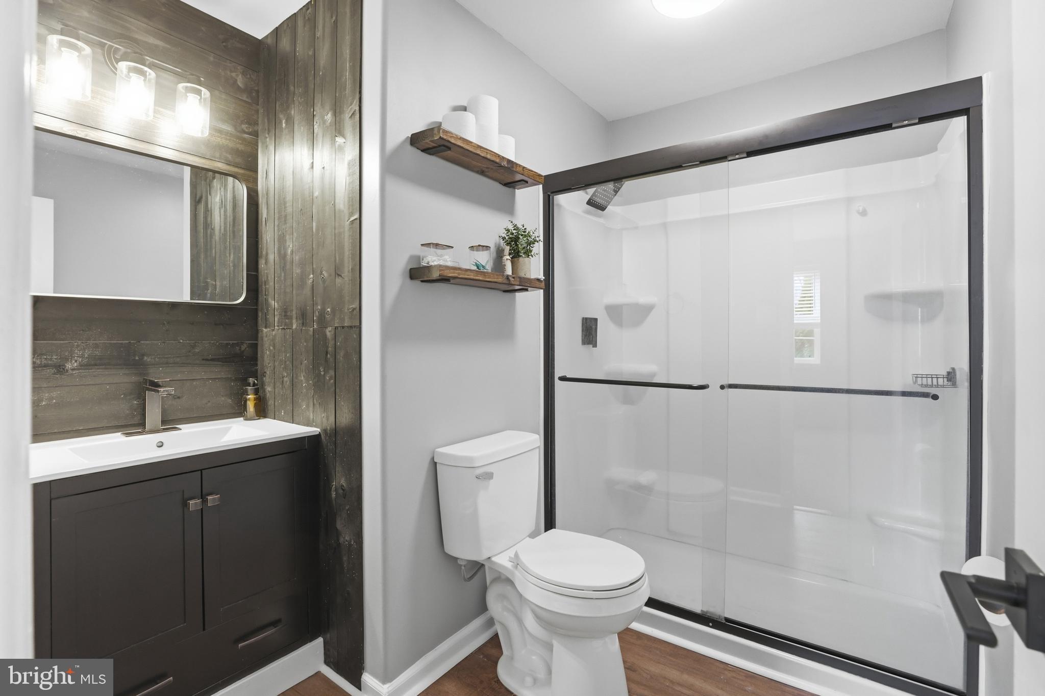 6844 Carnation Circle Frederick, MD 21703 - Photo 20 of 30 a bathroom with a sink and a mirror