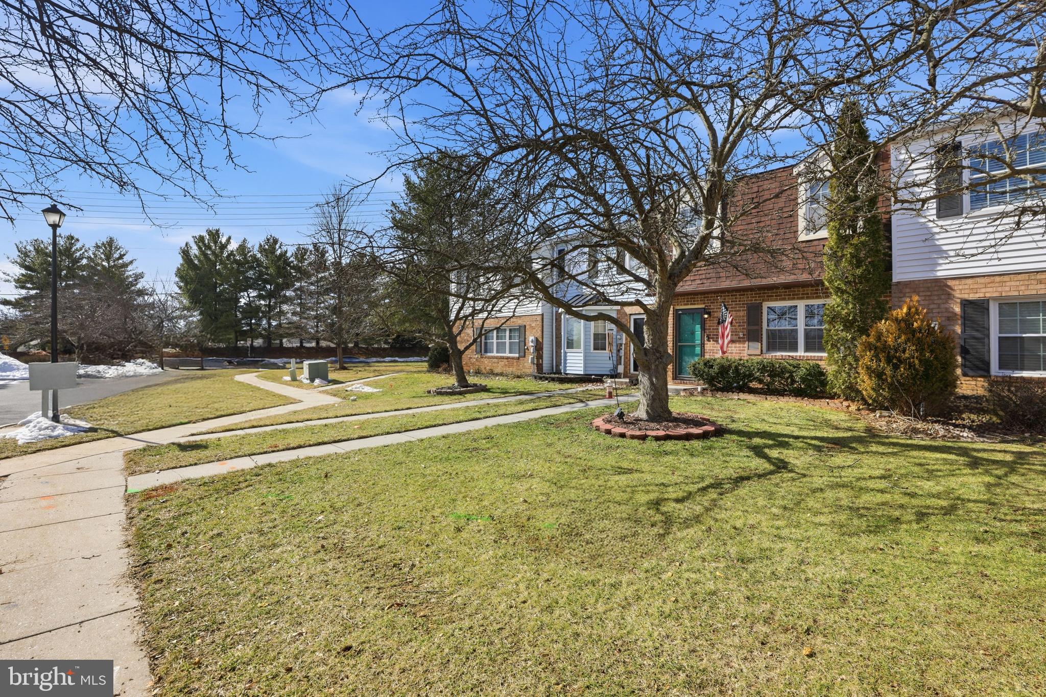 6844 Carnation Circle Frederick, MD 21703 - Photo 2 of 30 a view of swimming pool with outdoor seating and covered with trees