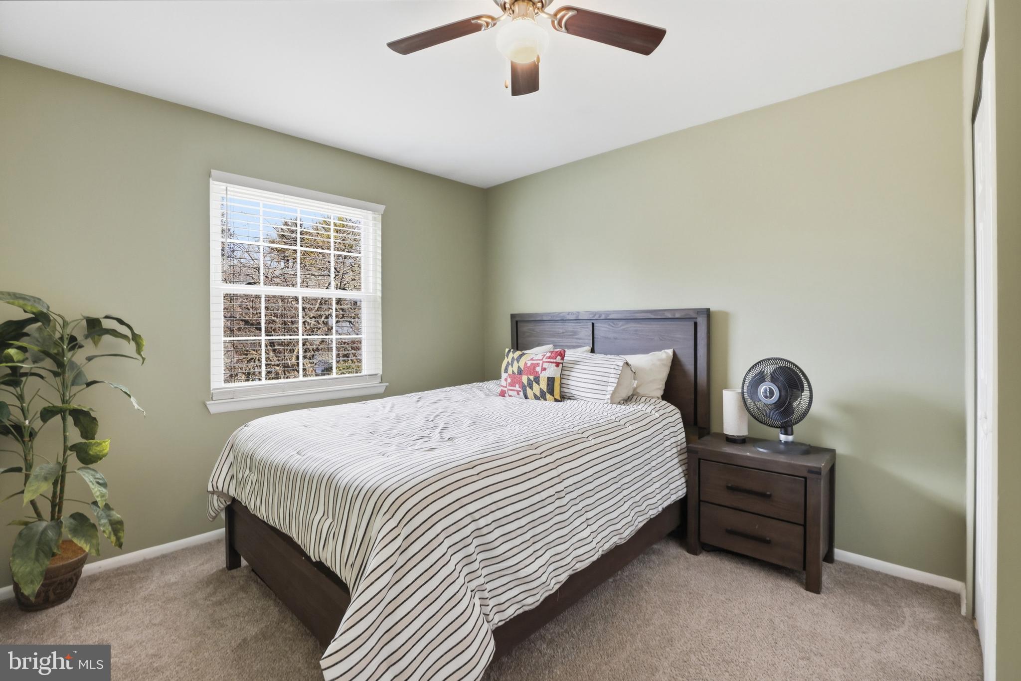 6844 Carnation Circle Frederick, MD 21703 - Photo 23 of 30 a bedroom with a bed and a window