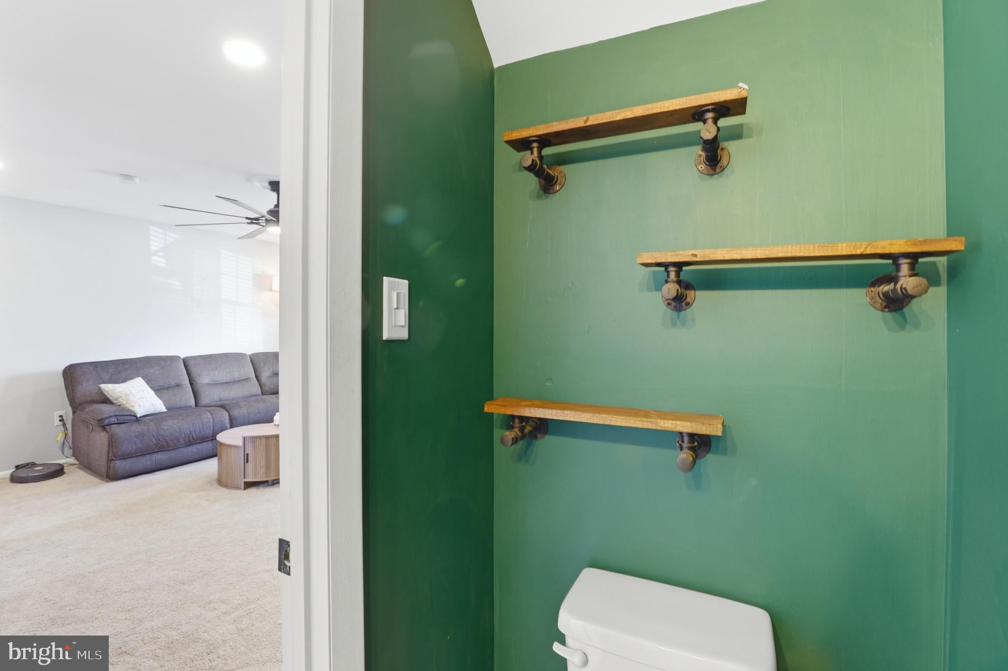 6844 Carnation Circle Frederick, MD 21703 - Photo 10 of 30 a bathroom with a toilet and a shower