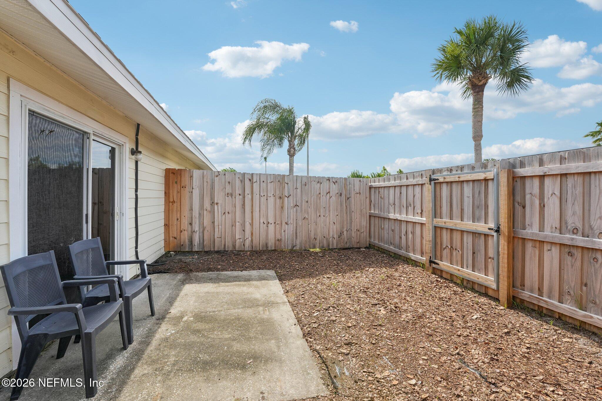 1845 Old Moultrie Road, Unit 24 St. Augustine, FL 32084 - Photo 11 of 11 Fenced Yard with Patio Space