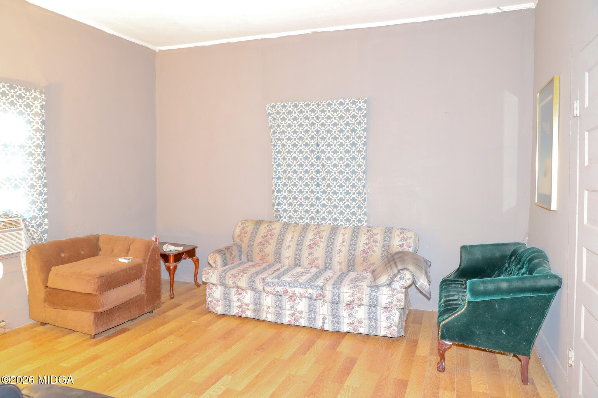 349 Madison Street Macon, GA 31201 - Photo 5 of 11 a living room with furniture and a couch
