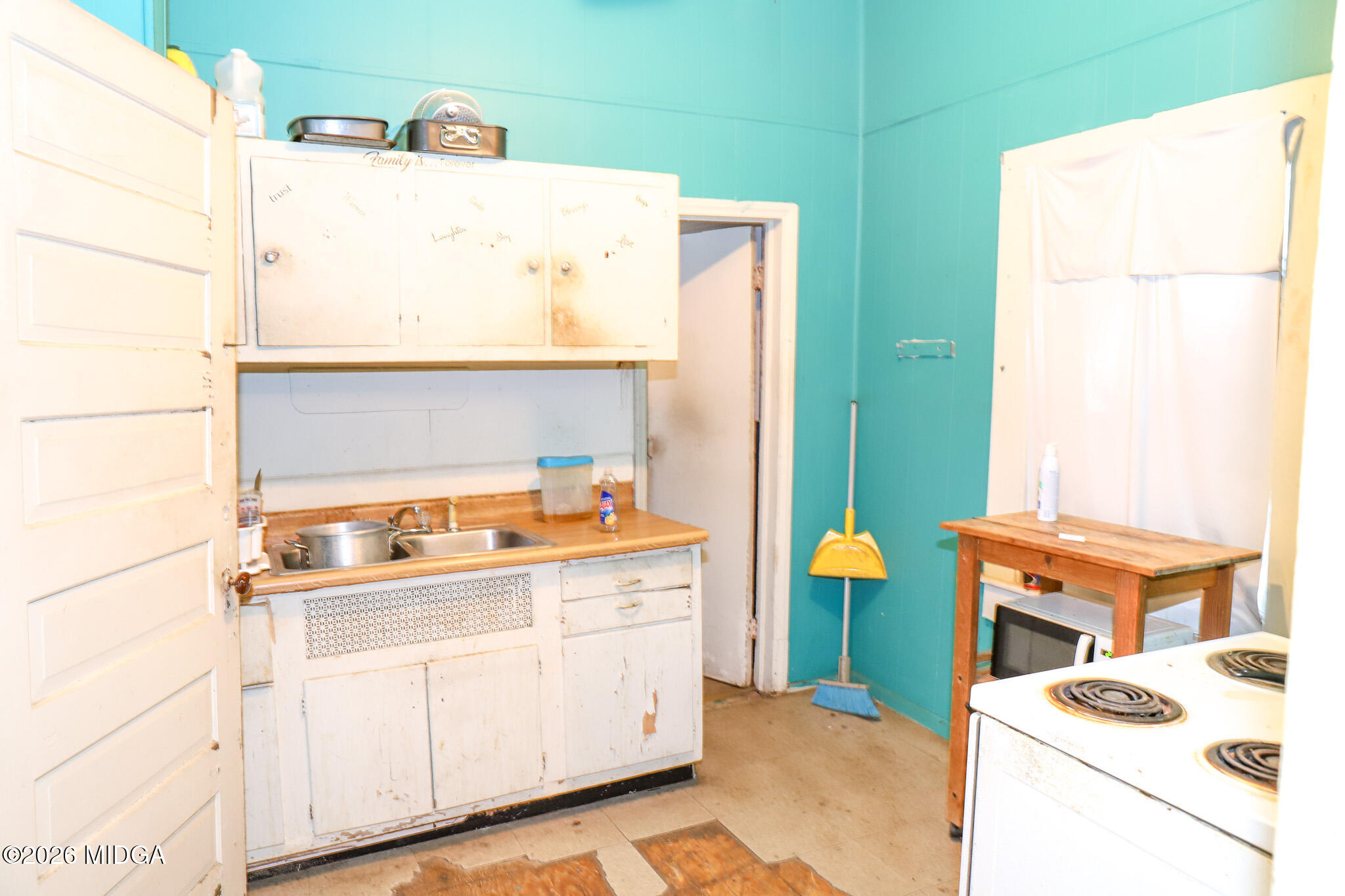 349 Madison Street Macon, GA 31201 - Photo 6 of 11 a utility room with dryer and washer