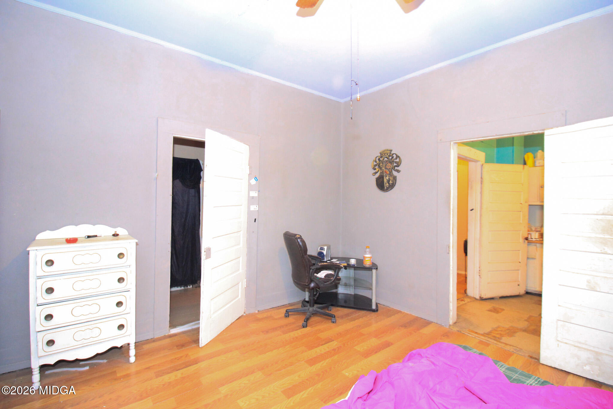 349 Madison Street Macon, GA 31201 - Photo 10 of 11 a bedroom with a bed and furniture