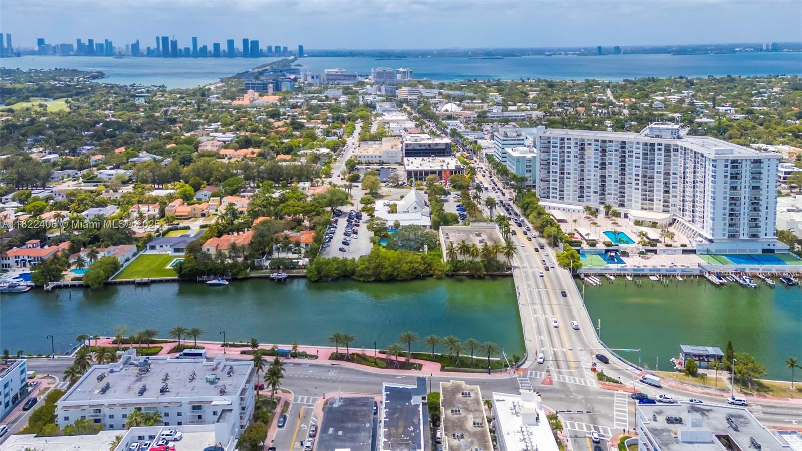 4015 Indian Creek Drive, Unit 106 Miami Beach, FL 33140 - Photo 28 of 29 an aerial view of residential building and lake