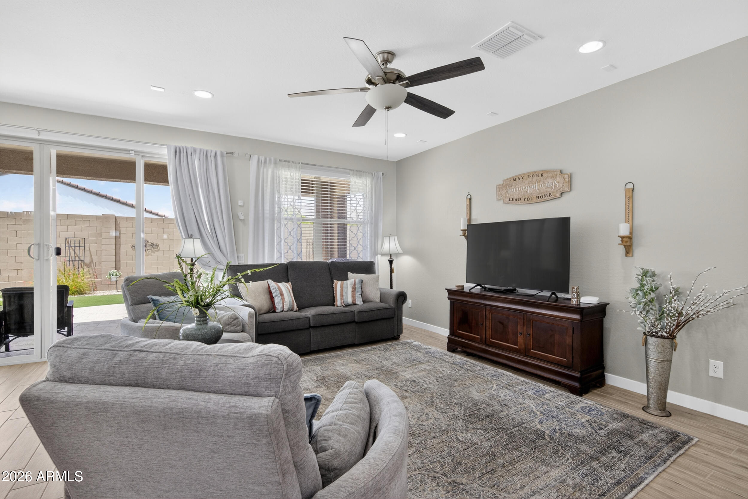 12330 East Soloman Road Gold Canyon, AZ 85118 - Photo 22 of 69 a living room with furniture and a flat screen tv