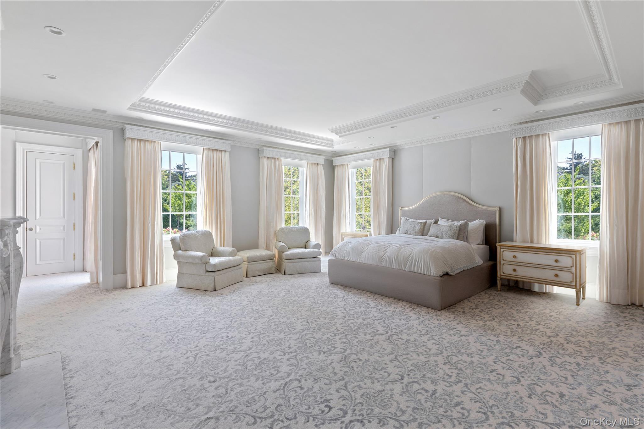 9 Hicks Lane Sands Point, NY 11050 - Photo 23 of 45 a bedroom with furniture and large windows