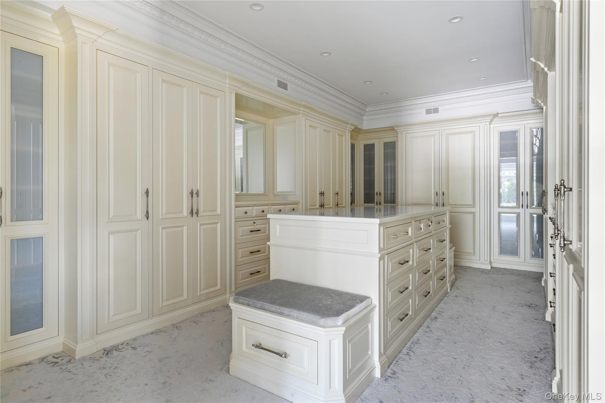 9 Hicks Lane Sands Point, NY 11050 - Photo 24 of 45 a bathroom with a sink a mirror and a shower