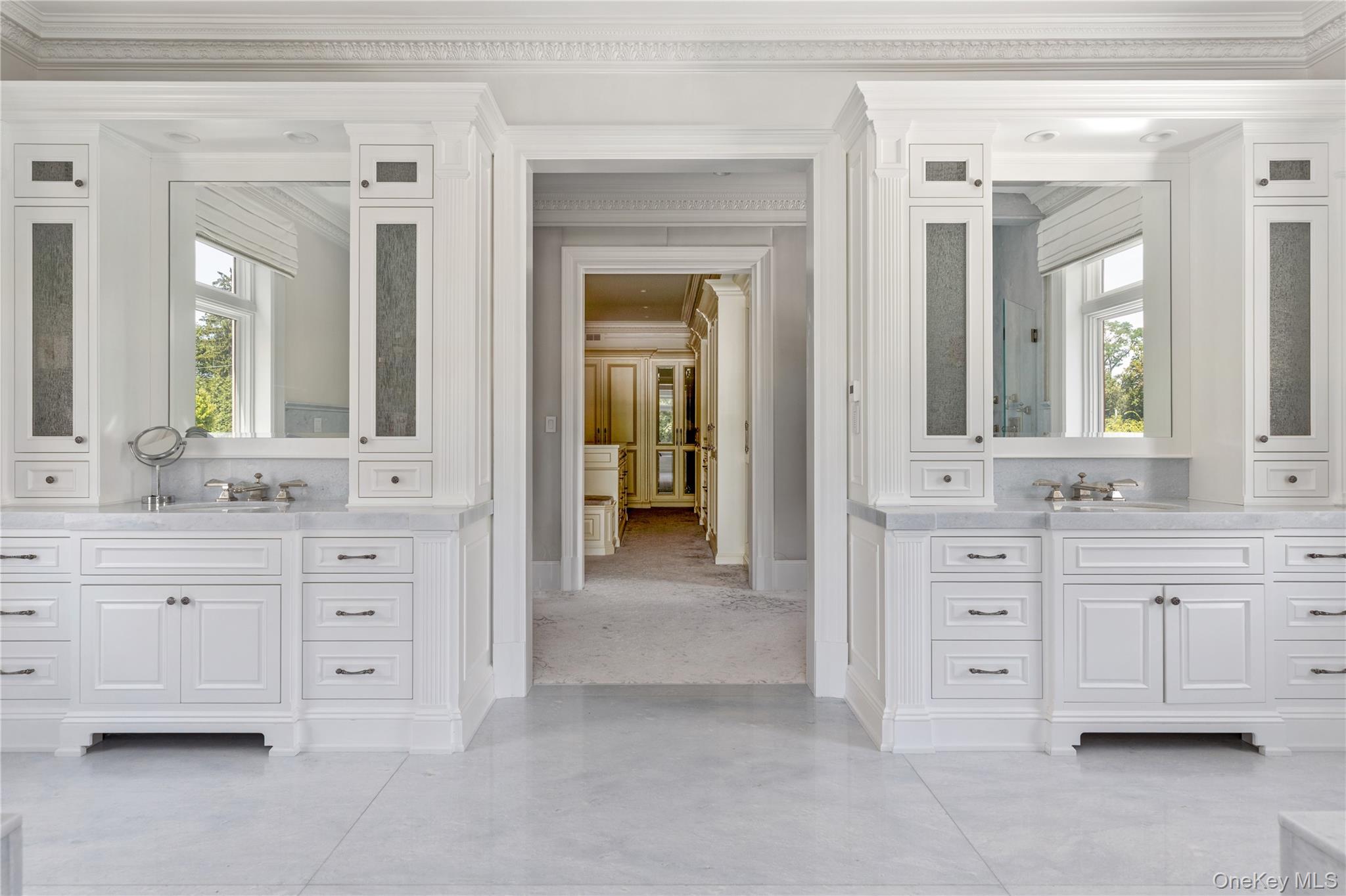9 Hicks Lane Sands Point, NY 11050 - Photo 26 of 45 a bathroom with a sink vanity and mirror