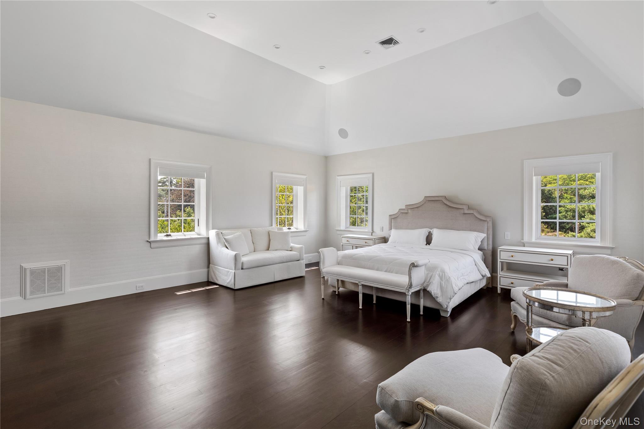 9 Hicks Lane Sands Point, NY 11050 - Photo 29 of 45 a bedroom with furniture and wooden floor