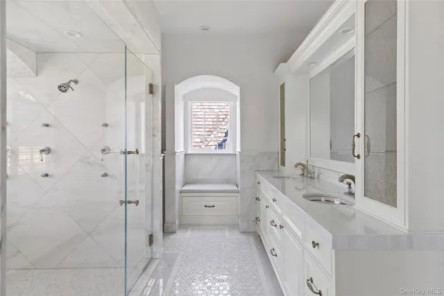 a living room with furniture a fireplace and wooden floor