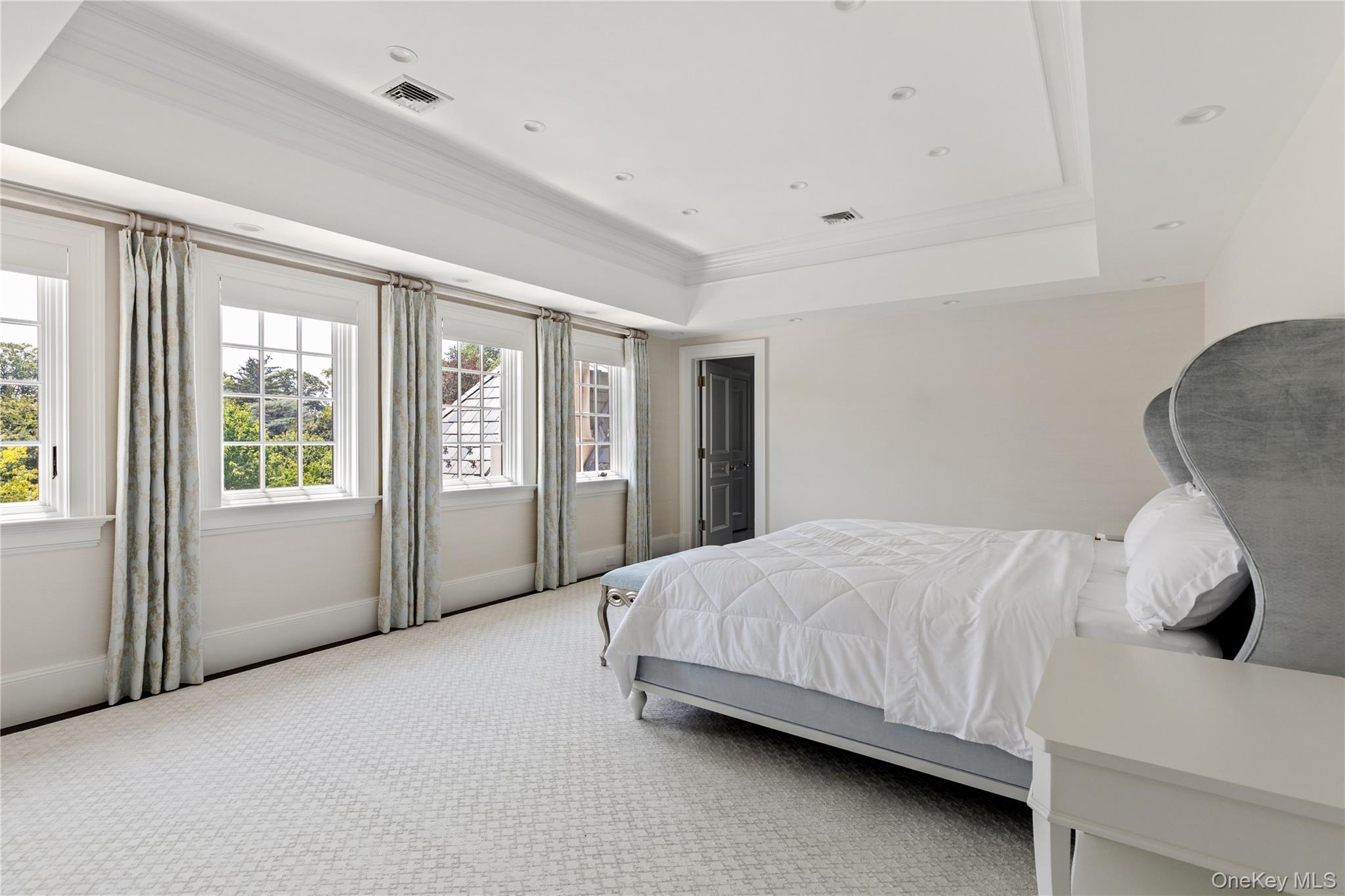 9 Hicks Lane Sands Point, NY 11050 - Photo 33 of 45 a bedroom with a bed and window