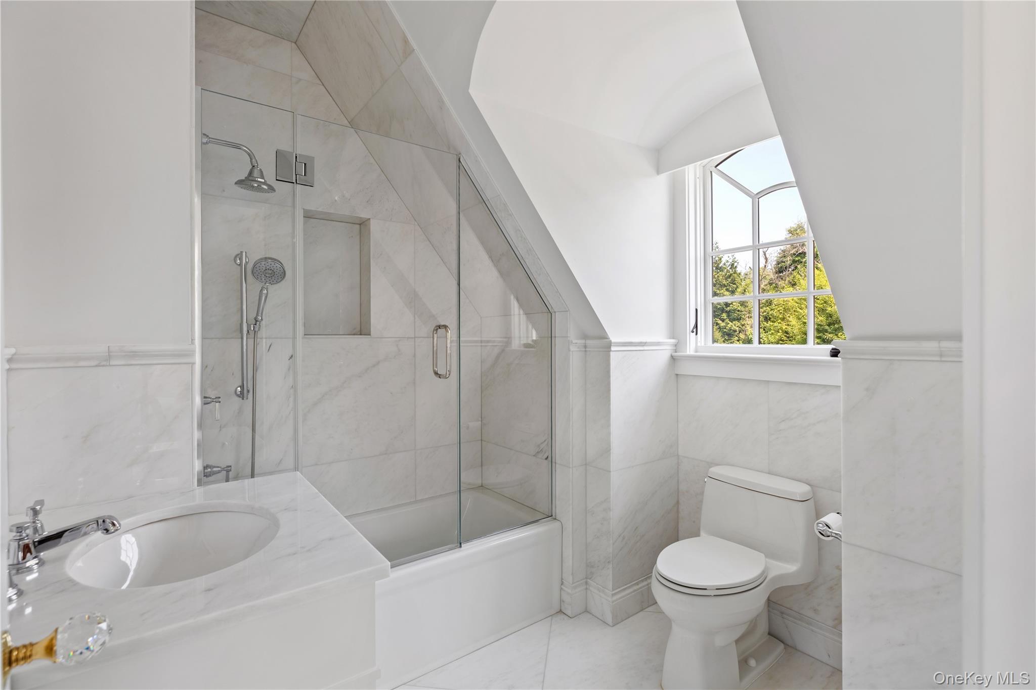 9 Hicks Lane Sands Point, NY 11050 - Photo 39 of 45 a bathroom with a sink and a bathtub