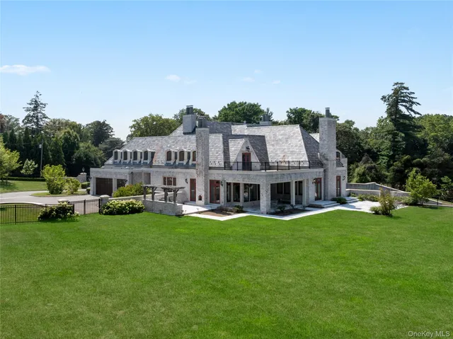 an aerial view of a house with a garden