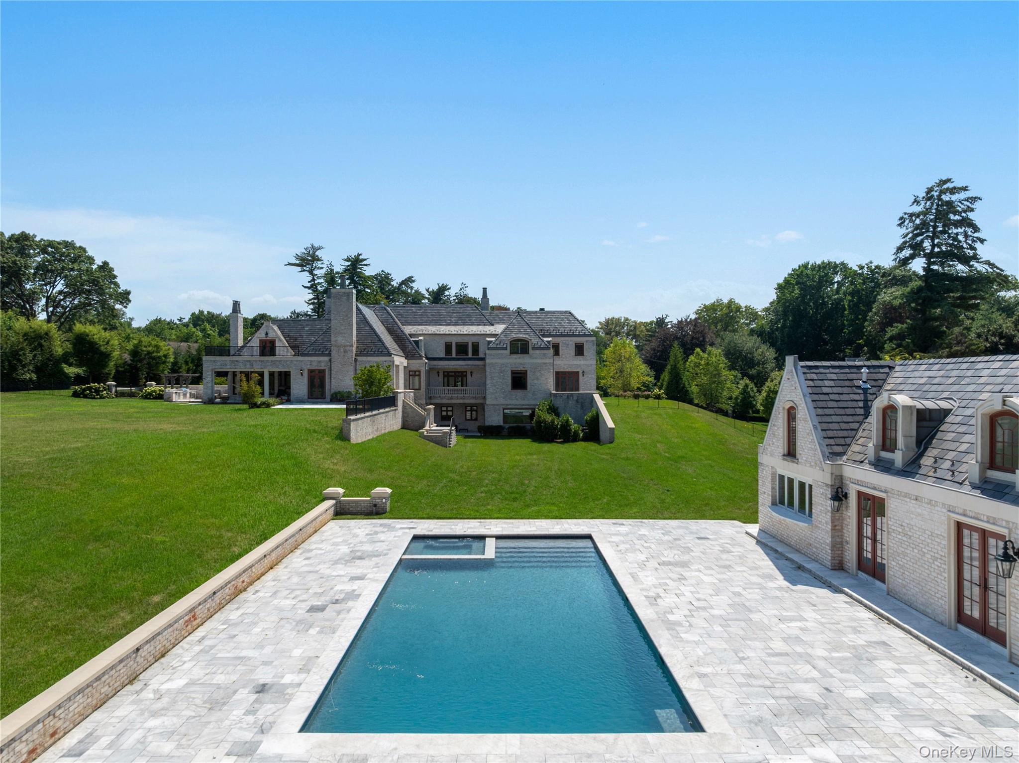 9 Hicks Lane Sands Point, NY 11050 - Photo 6 of 45 a view of a house with a yard