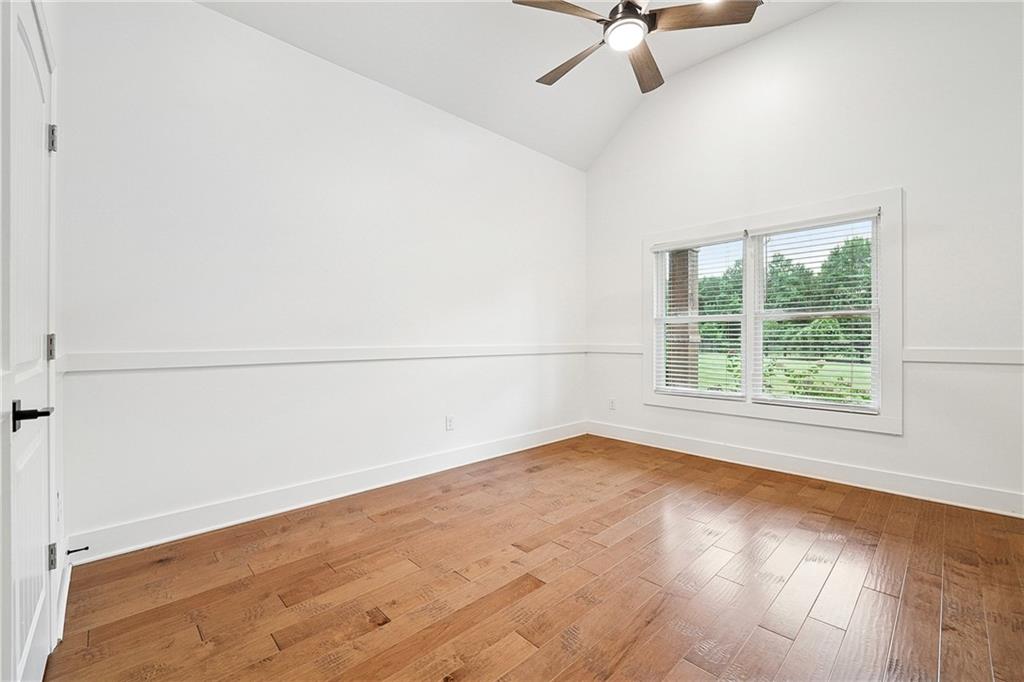 4603 Clarks Bridge Road Gainesville, GA 30506 - Photo 23 of 40 an empty room with a window