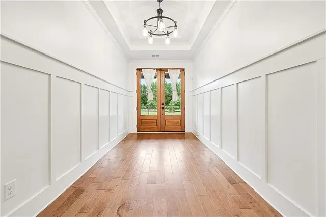 a view of entryway with wooden floor
