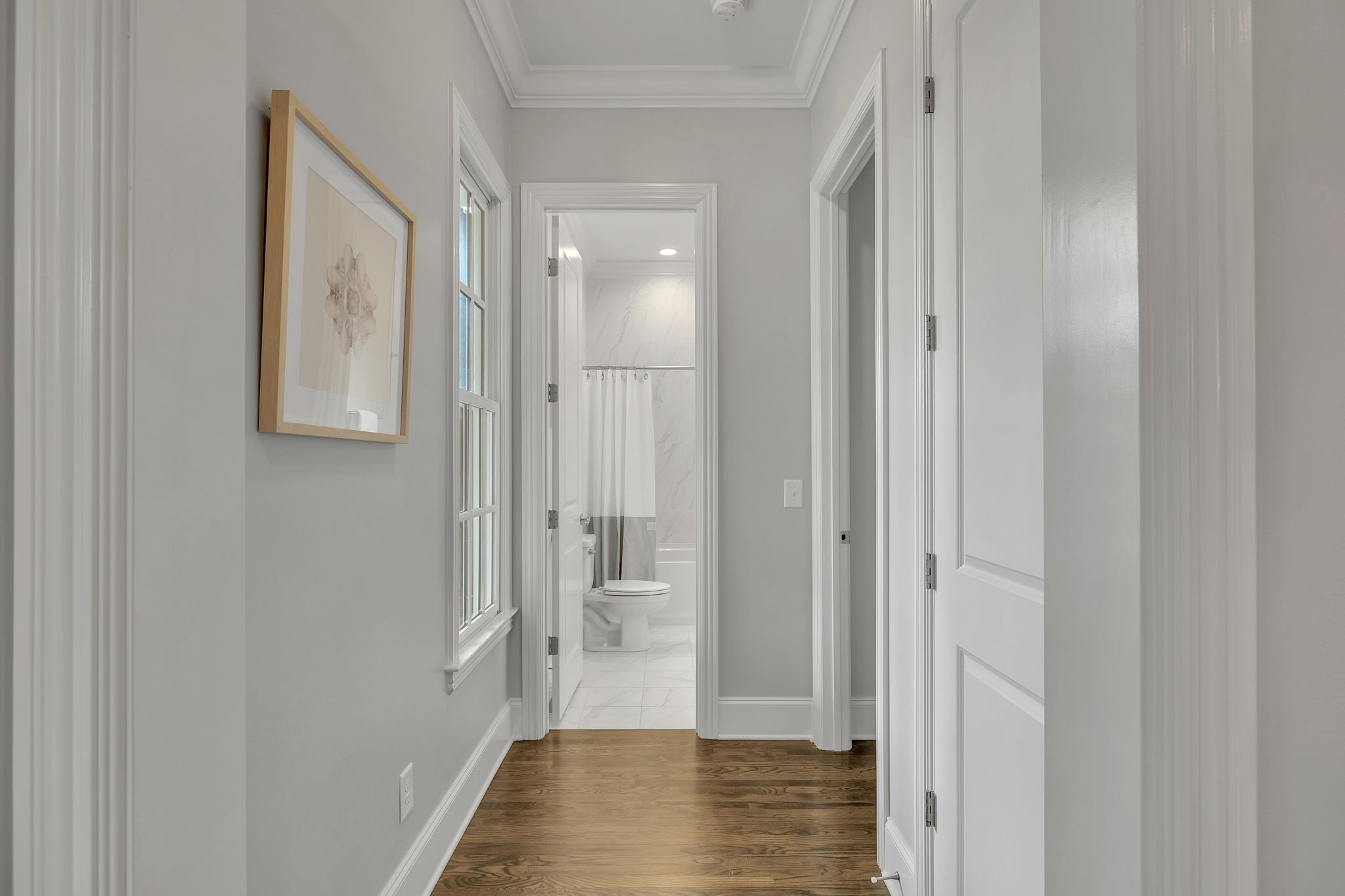 1606 Eliot Road Franklin, TN 37064 - Photo 11 of 49 a view of a hallway with wooden floor and closet