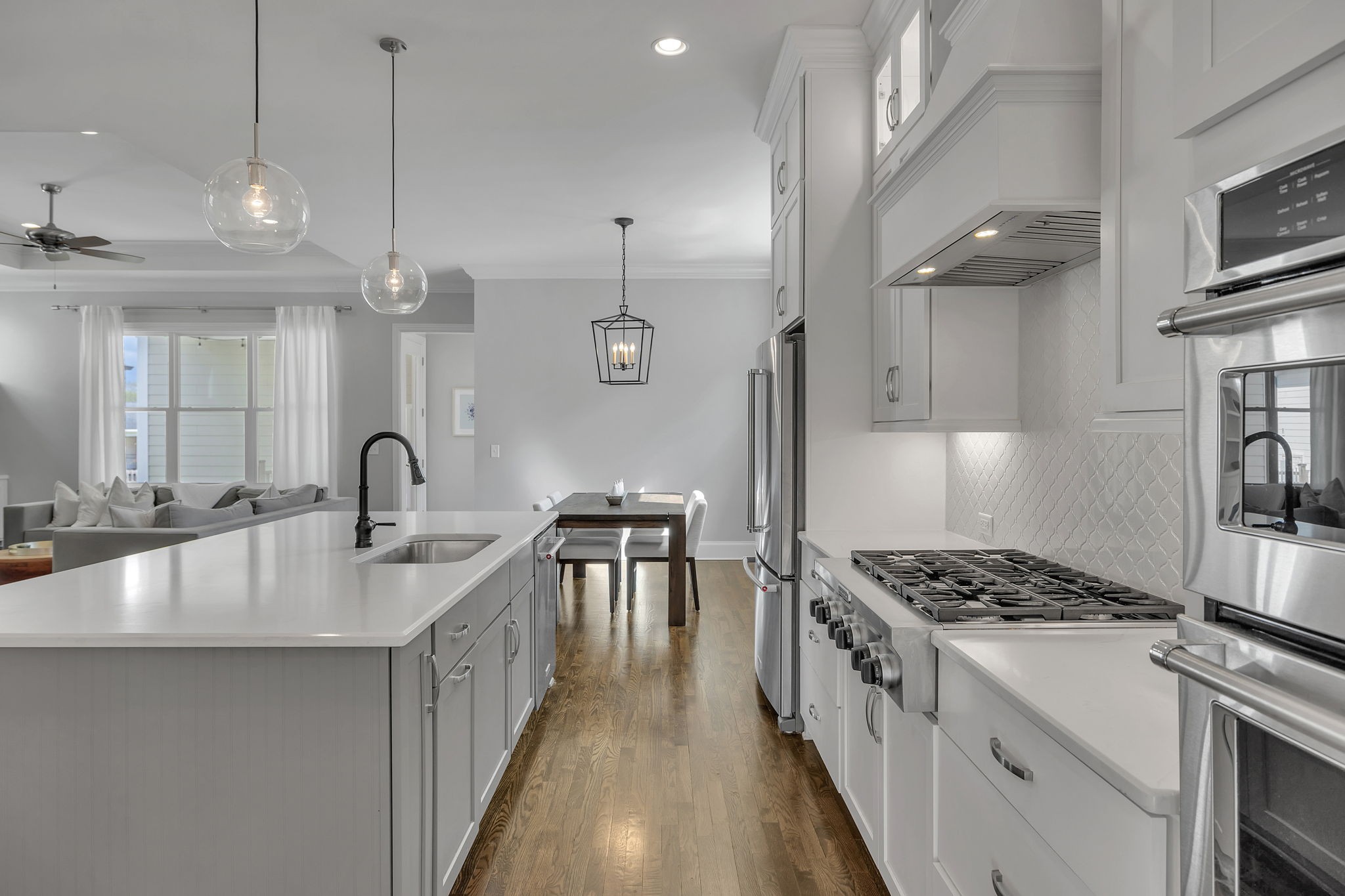 1606 Eliot Road Franklin, TN 37064 - Photo 15 of 49 a kitchen with counter top space a sink stainless steel appliances and cabinets
