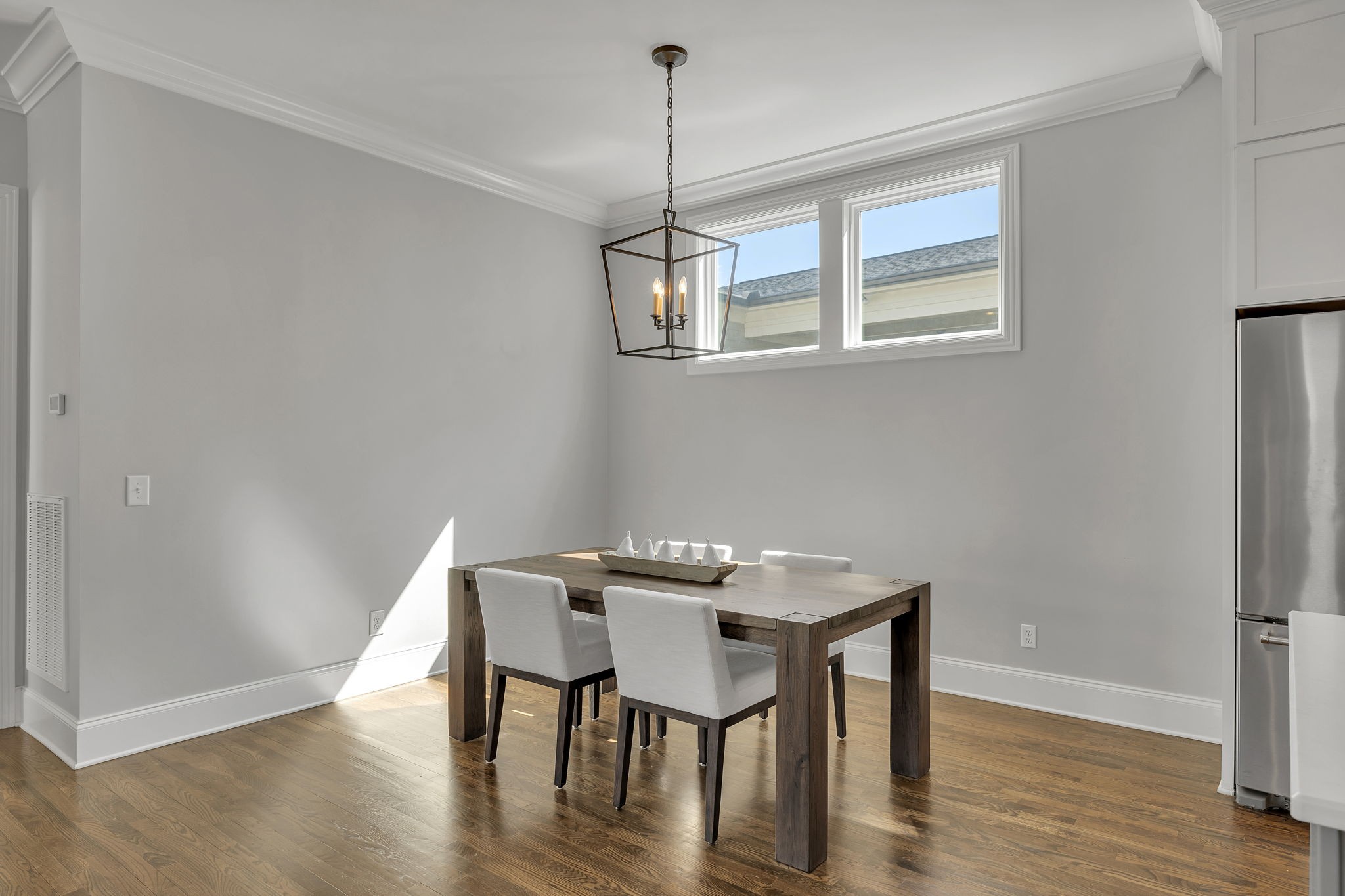 1606 Eliot Road Franklin, TN 37064 - Photo 16 of 49 a view of a dining room with furniture window and wooden floor