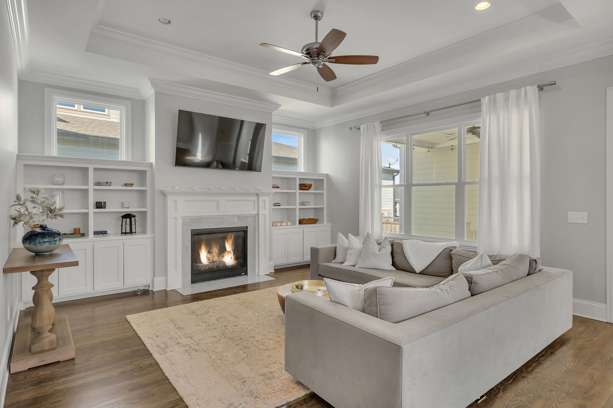 1606 Eliot Road Franklin, TN 37064 - Photo 19 of 49 a living room with furniture and a fireplace
