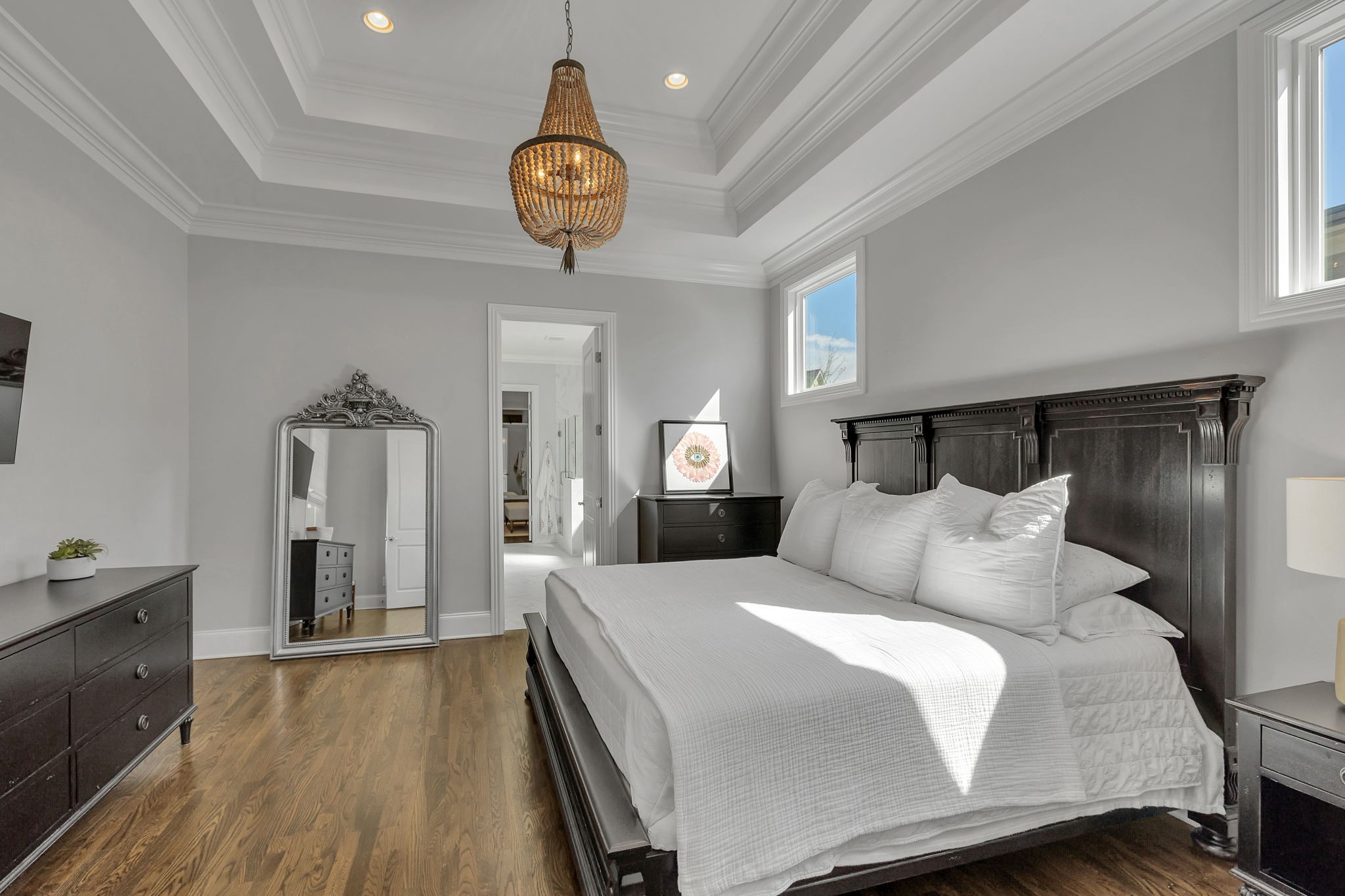 1606 Eliot Road Franklin, TN 37064 - Photo 20 of 49 a bedroom with a bed and a chandelier