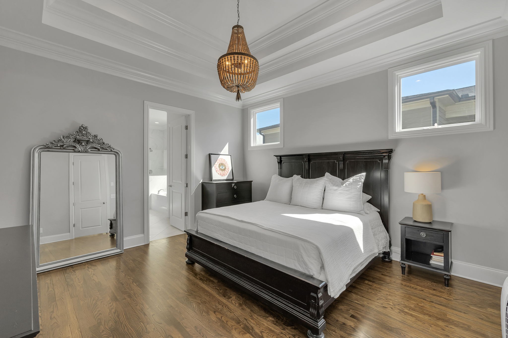 1606 Eliot Road Franklin, TN 37064 - Photo 21 of 49 a bedroom with a bed and a chandelier