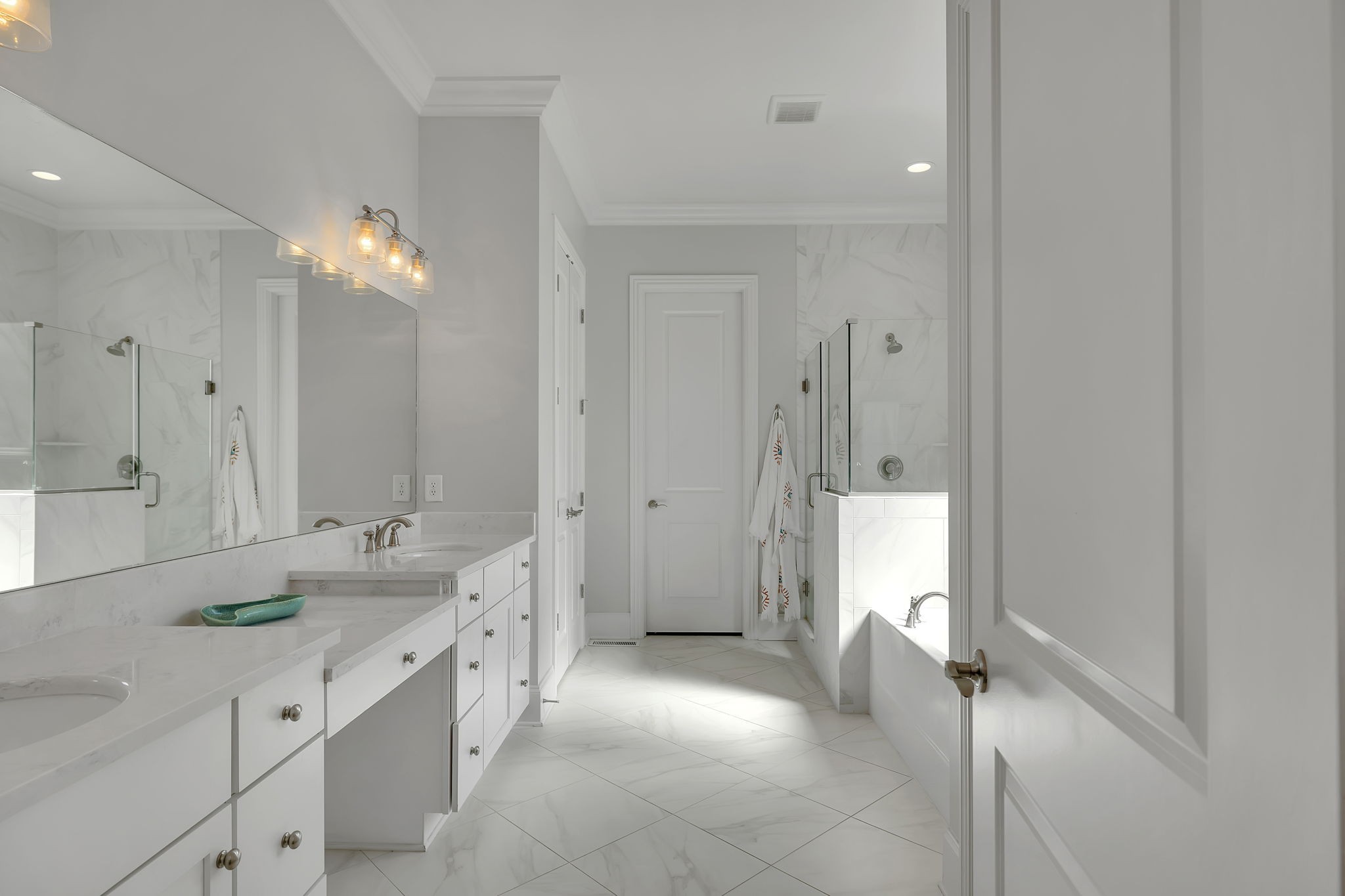 1606 Eliot Road Franklin, TN 37064 - Photo 22 of 49 a spacious bathroom with a double vanity sink mirror and a shower