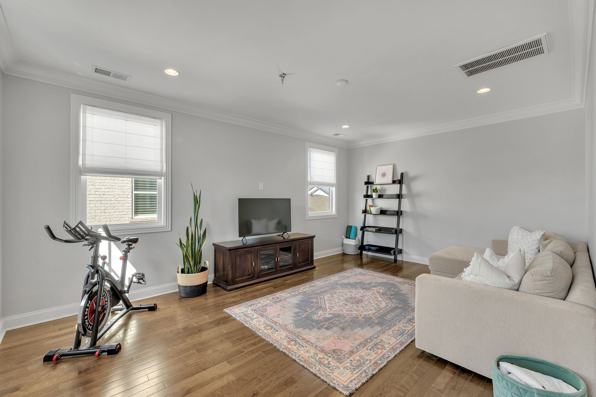 1606 Eliot Road Franklin, TN 37064 - Photo 27 of 49 a living room with furniture a window and a flat screen tv