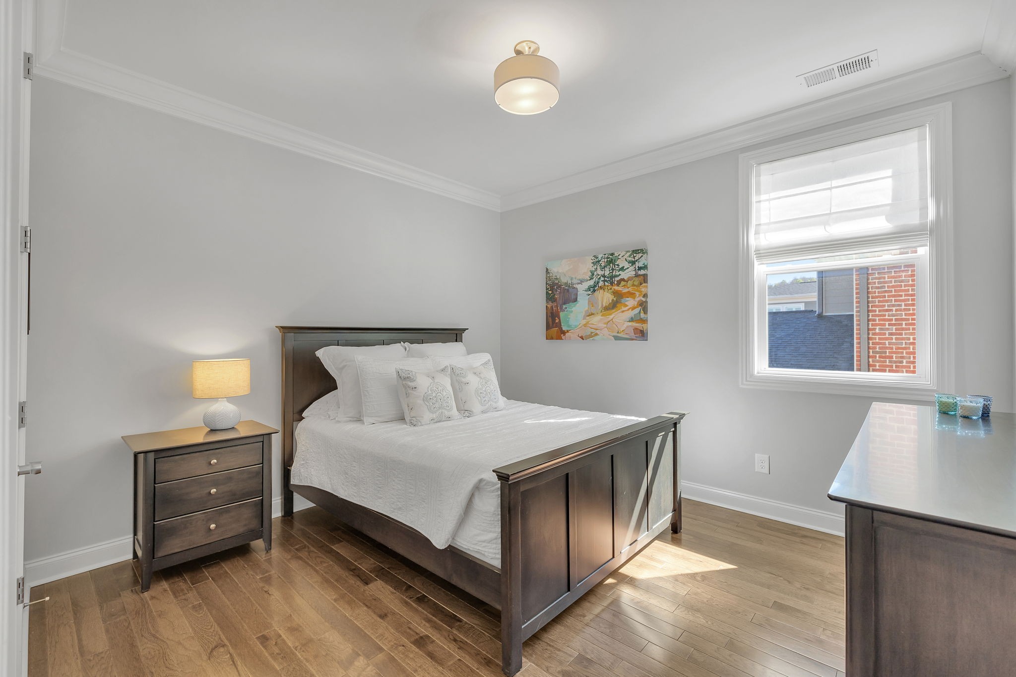 1606 Eliot Road Franklin, TN 37064 - Photo 29 of 49 a bedroom with a bed and a night stand