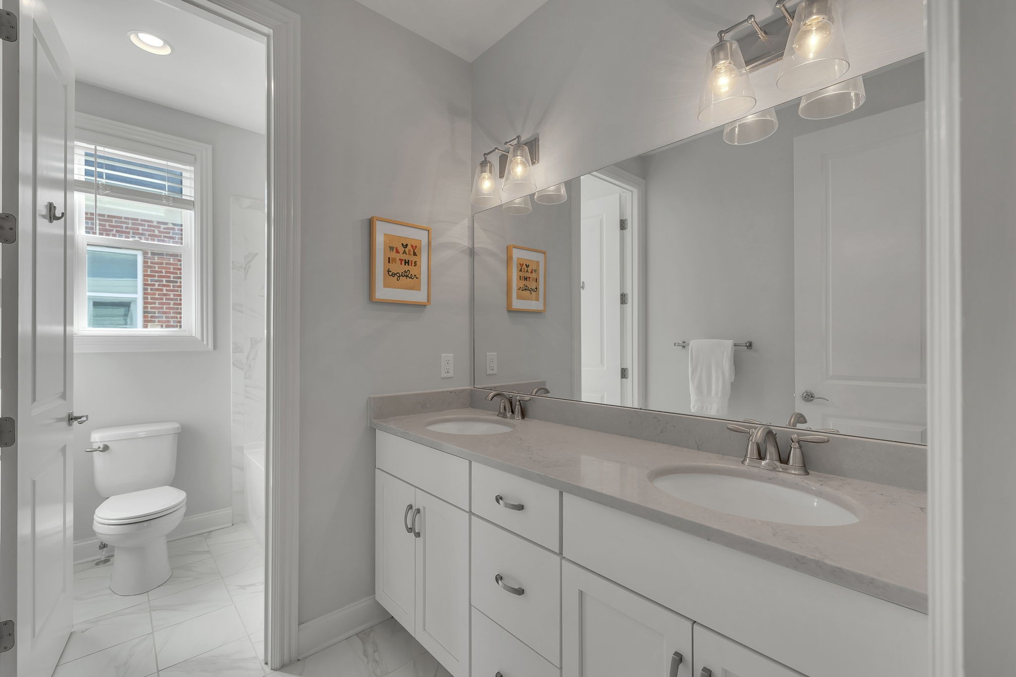 1606 Eliot Road Franklin, TN 37064 - Photo 30 of 49 a bathroom with a granite countertop double vanity sink a mirror and a toilet