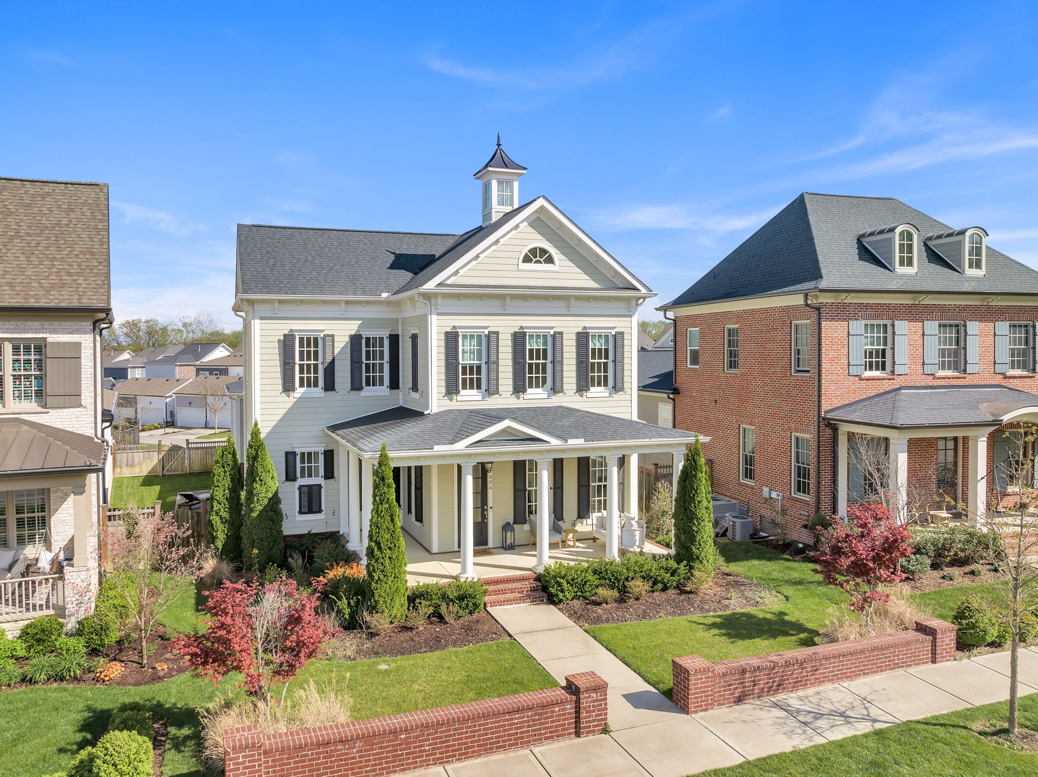 1606 Eliot Road Franklin, TN 37064 - Photo 3 of 49 a front view of a house with a yard