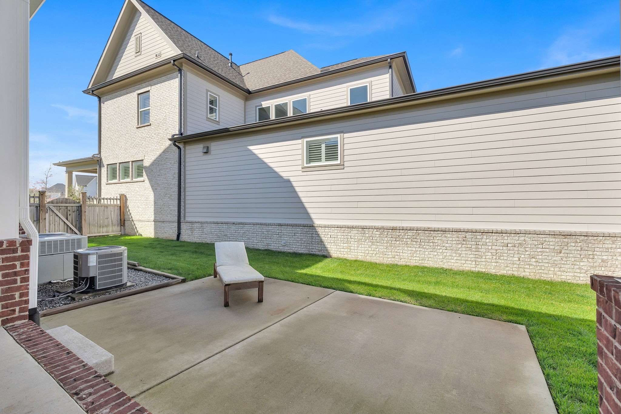 1606 Eliot Road Franklin, TN 37064 - Photo 33 of 49 a front view of a house with a yard and garage