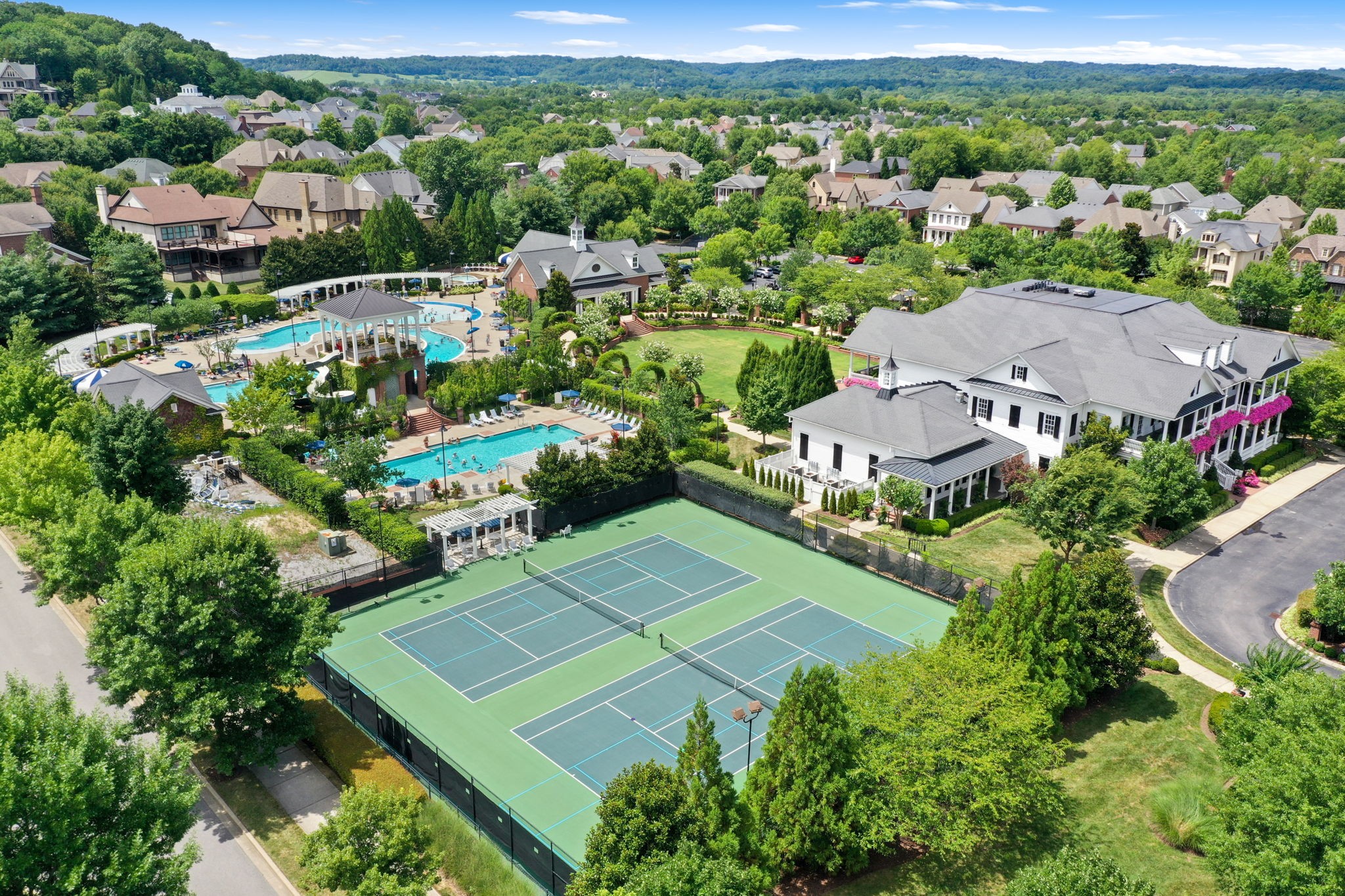 1606 Eliot Road Franklin, TN 37064 - Photo 47 of 49 an aerial view of multiple houses with a yard