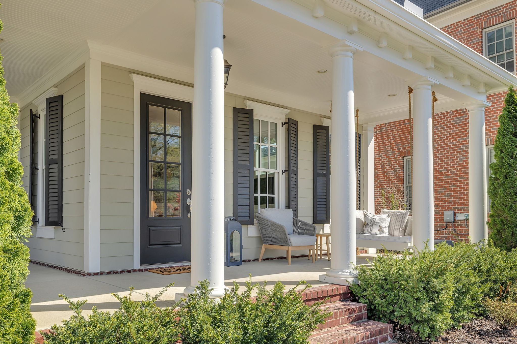 1606 Eliot Road Franklin, TN 37064 - Photo 5 of 49 a front view of a house with a garden
